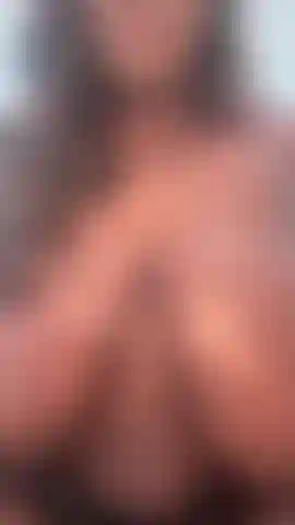 Oiling these huge natural tits