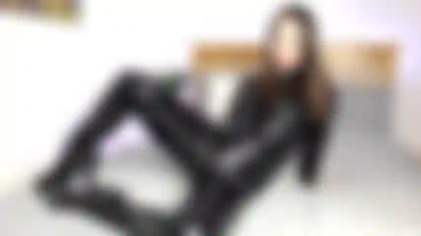 DP in a PVC catsuit
