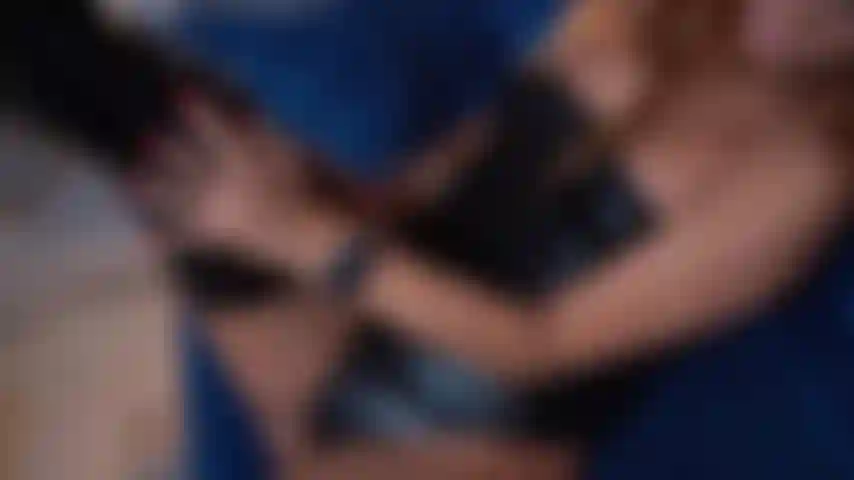 La tua dea con lunghi stivali in lattice