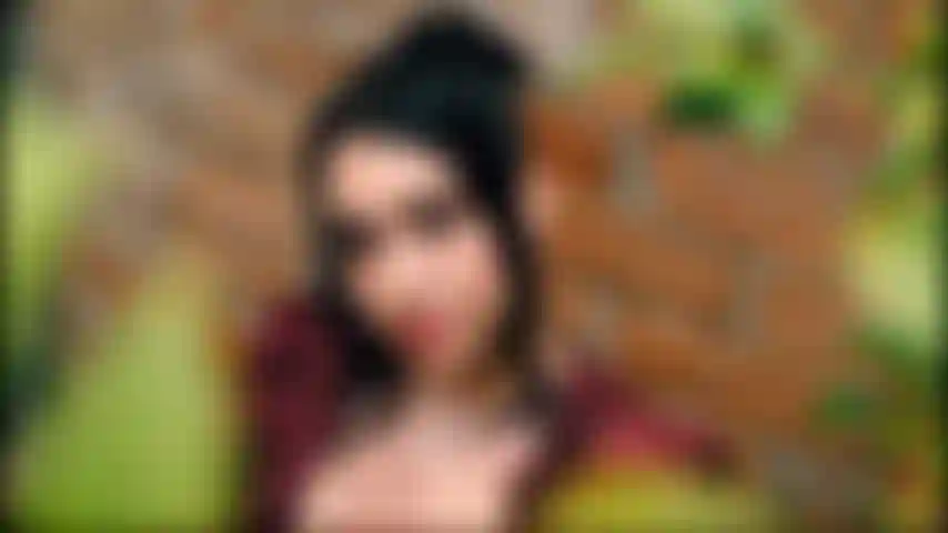 A lady in public being very hot