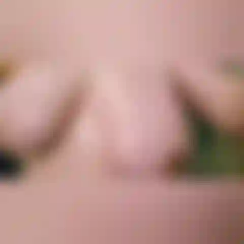 Mi insapono le tette sotto la doccia.