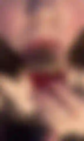 Goddess Licking a Strawberry