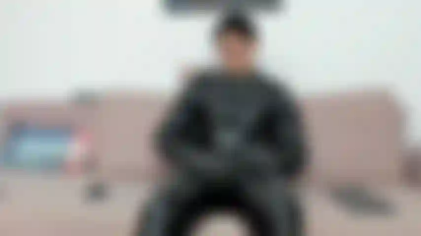 Getting dressed in full leather , teasing my bulge, taking my