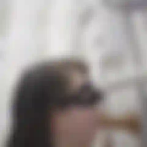 Sucking and playing with wall dildo