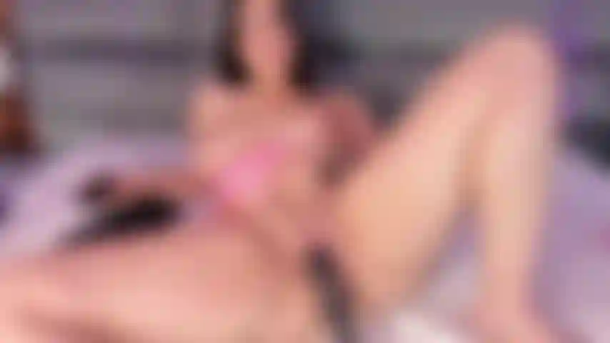 Young Latina with a pink pussy enjoys her domi in her pussy while masturbating her clitoris