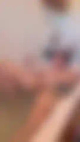 MILF gets caught playing in the bath by lad who