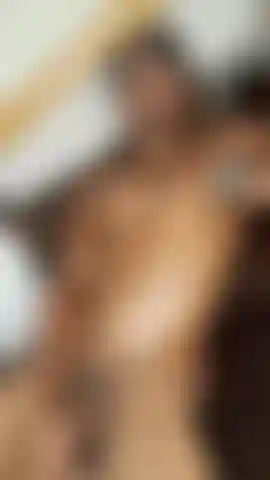 Lying relaxed in my bed and enjoying myself, would you like to be by my side?