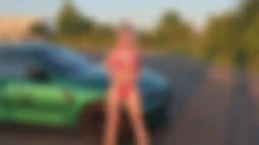 Sexy strip in microkini.