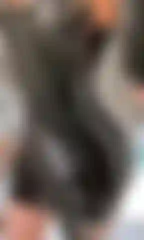 Indosso un vestito in lattice.