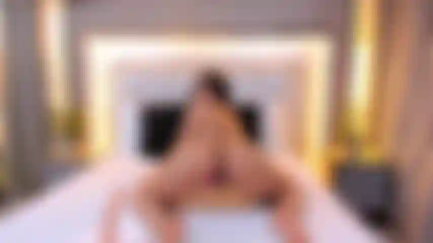 Oiled girl plays with a big cock between her buttocks