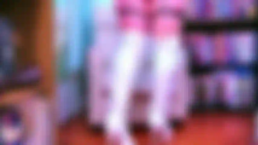 Thigh-high white leather boots and lingerie w encouraged Femdom boot licking and boot worship. 6-inch stiletto heels on thigh-high boots. Revealing erotic lingerie, but technically non-nude.