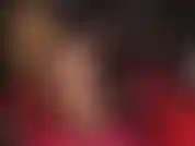 Dominatrice di gomma. Una dea in lattice semitrasparente e nero.