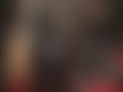 Mistress vivian in una tuta attillata in lattice nero con cappuccio di gomma, guanti in lattice e un grande strapon bianco. - Adoro la perfezione feticista e scintillante in gomma attillata con dominazione tramite strapon.