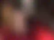 Provocante e provocante con calze di nylon con cuciture color carne e giarrettiere.