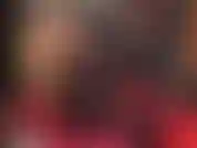 Con stivali alti fino al ginocchio, gambe lunghe e meravigliose, calze e collant in pizzo.