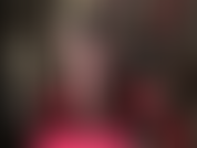 Con gambe stupende in collant, sensuali calze di nylon nere, décolleté con punta aperta e mules.