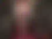 Dominazione sexy con strapon, 20 cm di cazzo nero, corsetto di pelle, collant neri e parrucca che cambia da nera a rossa. Hot!