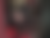 Il corpo squisito della mia amante in lattice nero attillato, collant neri e stivali alti e lucidi sopra il ginocchio.