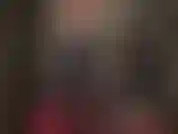 La tua padrona fetish in una tuta di vinile nero lucido ha un enorme cazzo nero per te.