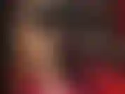 Indosso una minigonna in lattice e dei collant lucidi e sexy.