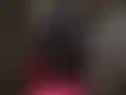 La padrona accarezza il tuo dolorante cazzo da schiavo indossando una lucida gomma nera, calze sexy e giarrettiere, abbinate a lunghi stivali lucidi.