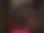 Una meravigliosa tuta attillata in lycra semitrasparente con corsetto e stivali alti.