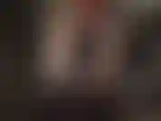 Dominatrice con strapon in tuta di lattice: il grosso cazzo di gomma nera è lucido tanto quanto la tuta di lattice attillata della mia padrona.