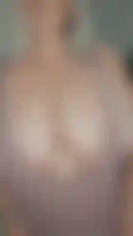 Look at those massive natural tits bounce  filthy milf  teasing with my little vest then getting them out to play & suck on