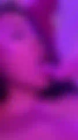 Sophie face close up sucking dildo passionately.