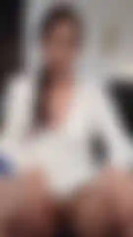 She spreads her legs, inviting the camera into her fantasy.